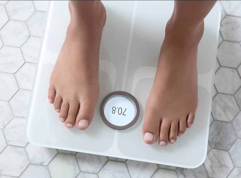 Aria is a Fitbit device. Aria is a Fitbit device. Here's a high-tech weighing scale that's perfect for dieters. It tells you a lot more than your weight. The Fitbit Aria can measure the body fat percentage and BMI of up to 8 people, then wirelessly upload the data to your computer for progress tracking. It captures data that is supported and works nicely with a variety of other apps. It will connect with your smartphone and send you an alert when you reach a fitness goal. To share with your friends, earn accomplishment badges.