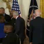 56272739-10690391-Obama_is_seen_to_the_side_chatting_with_fellow_politicians_while-m-34_1649219214793