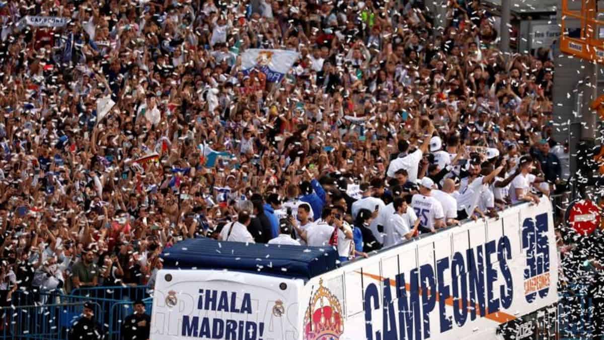 Thousands of fans fill the streets as Real Madrid celebrates their La Liga title with a bus procession
