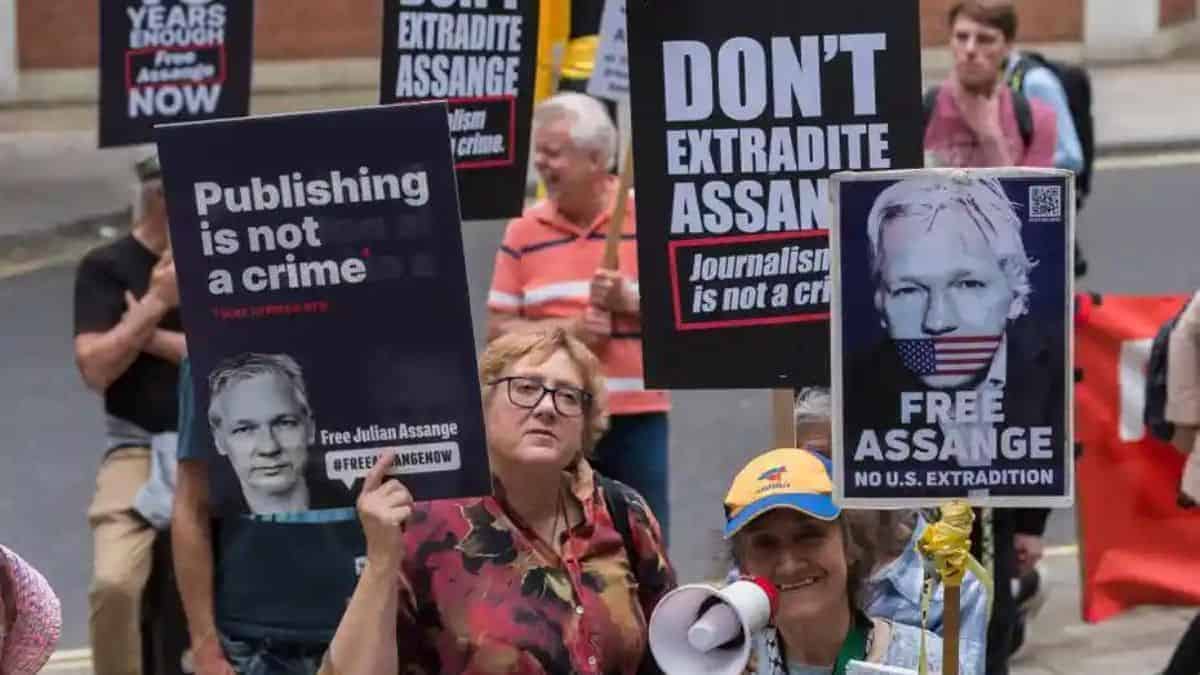 The UK home secretary claims that Julian Assange can be extradited