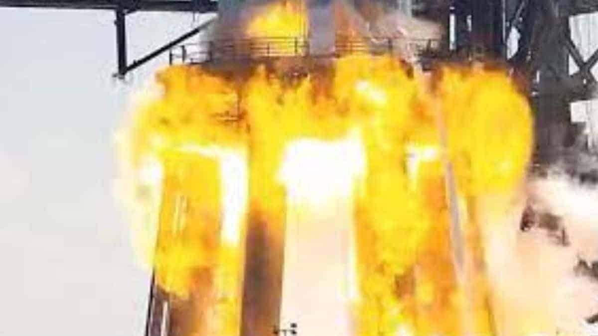 At the SpaceX facility, a booster rocket bursts into flames during testing